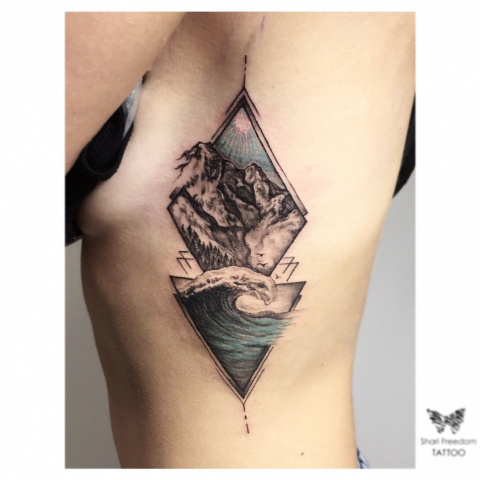 tetování hory a les